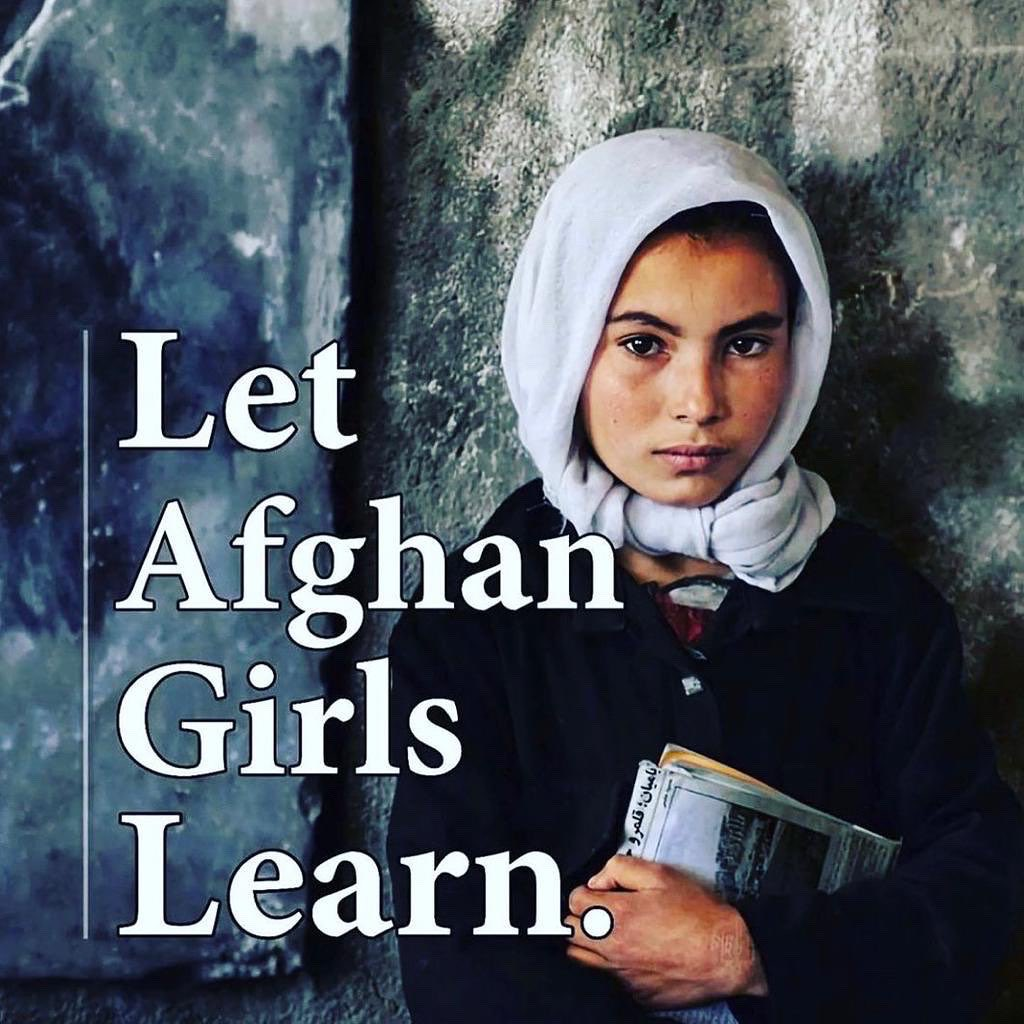 Let Afghan Girls Learn - Young Afghan girl holding books